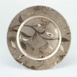 Rose-gold charger plate with leaf pattern
