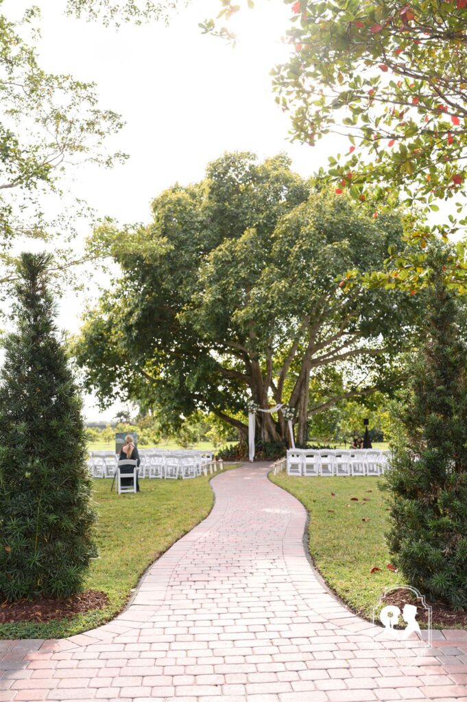 Curved garden walkway at Cinco Farm outdoor event venue in Miami