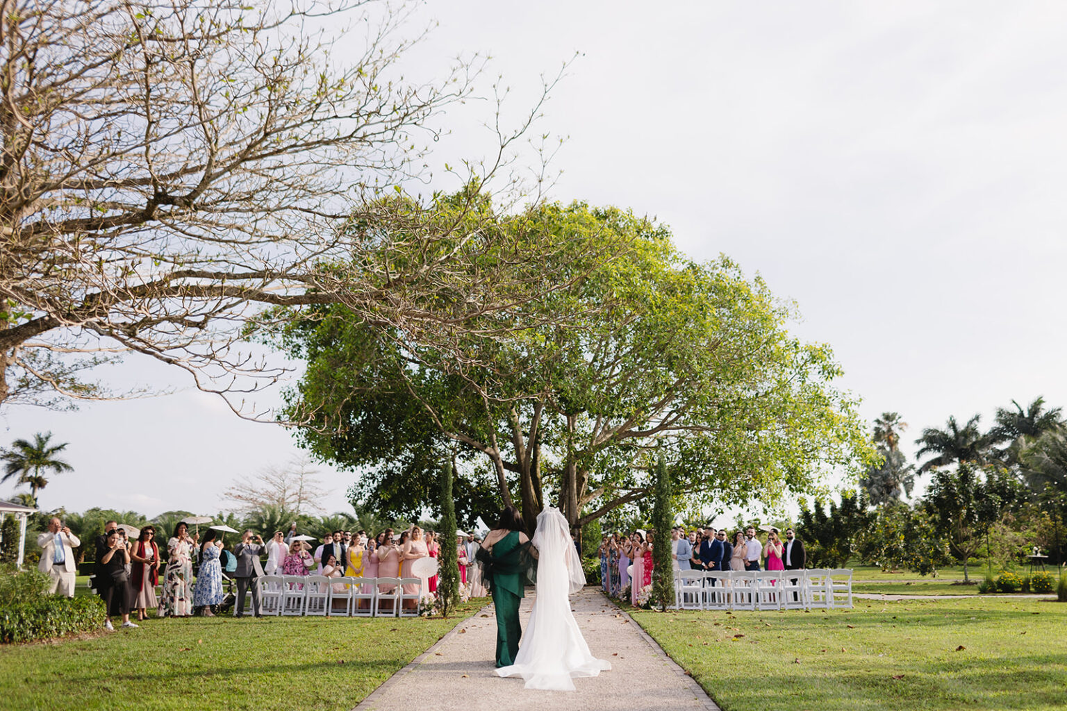 Outdoor garden wedding ceremony at Cinco Farm in Miami