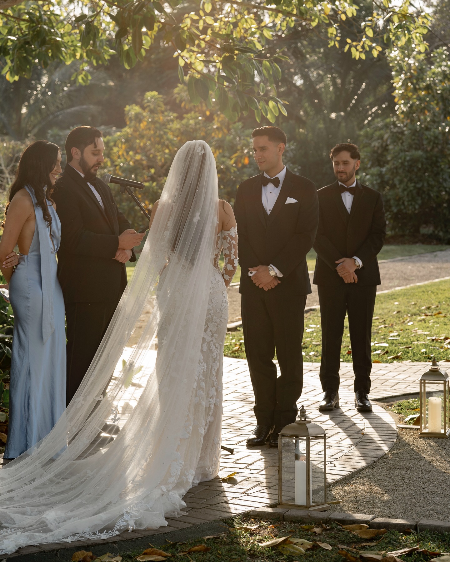 Outdoor wedding ceremony in the gardens at Cinco Farm in Miami