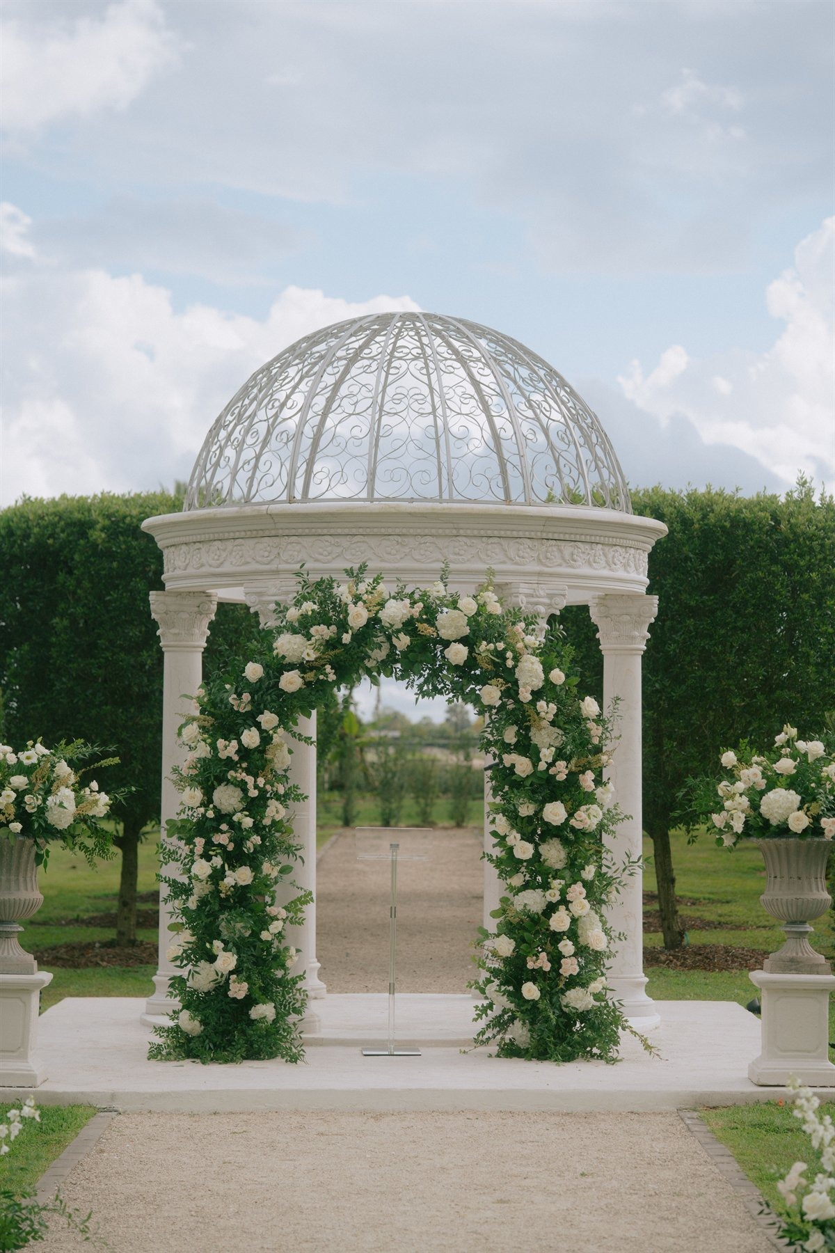 Floral ceremony gazebo at Cinco Farm wedding venue in Miami